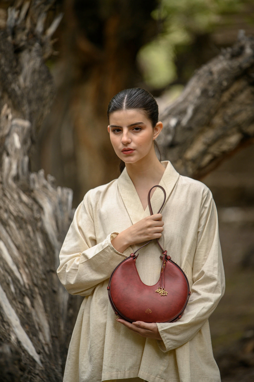 Lole Bordeaux linearity bag with model